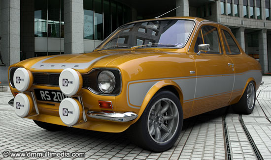 Escort RS2000 in yellow with contrasting silver RS stripes, sitting on Minilite wheels with polished rims