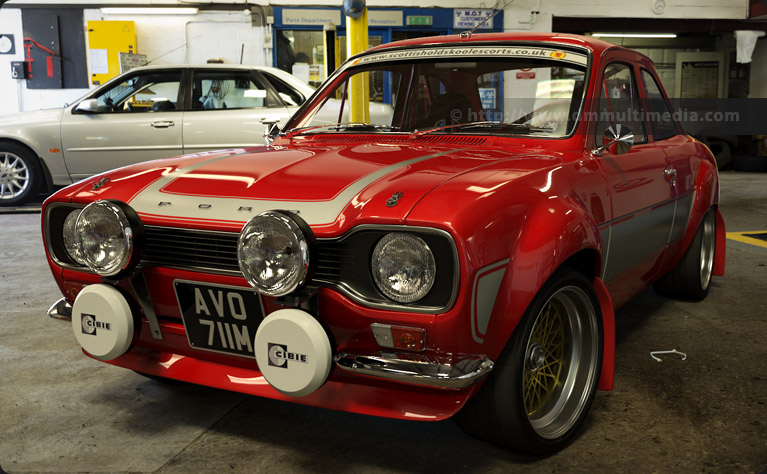 Escort MK1 RS2000 in Red with dark gey stripes, in the Garage